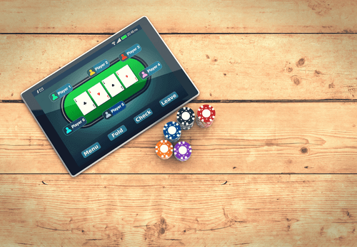 Online Casinos Reviews Bonus Offers Photo of Tablet with Poker Game & Chips